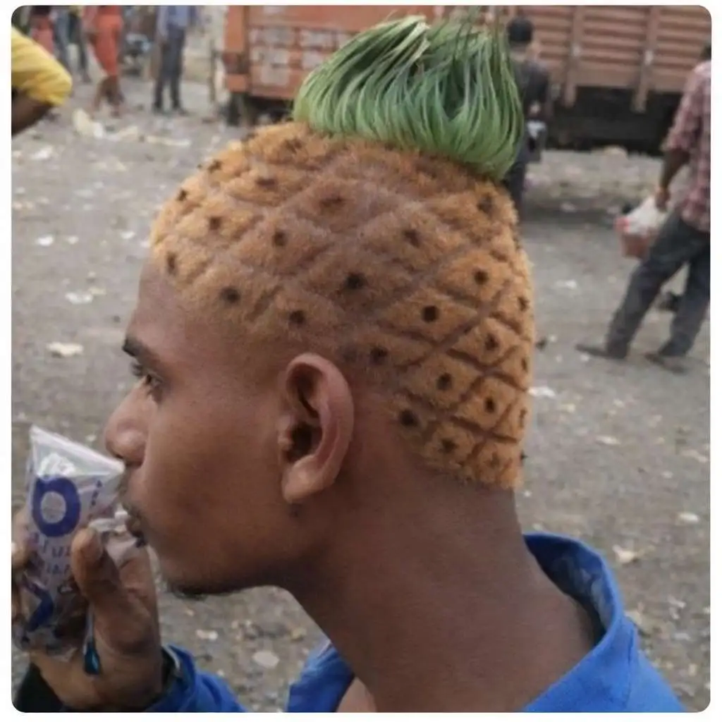 Side view of a person with a pineapple-inspired haircut featuring a textured blond pattern and a bright green tuft styled on top